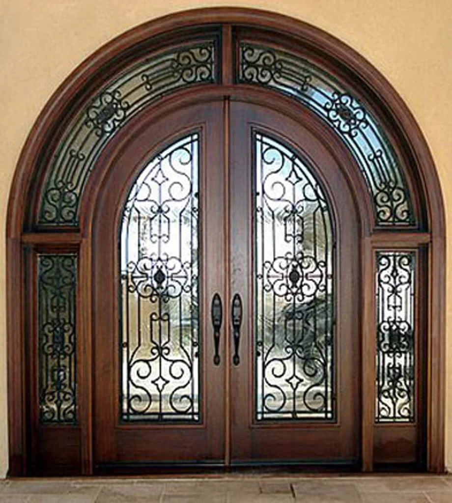 Radius-top wood and iron entry door